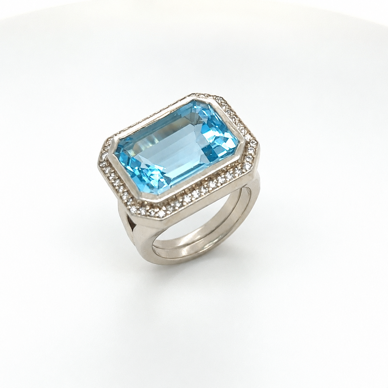 .925 Sterling Silver Diamond and Blue Topaz Ring