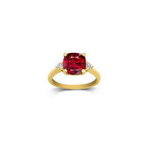 Center view of 14KT Yellow gold ring features a genuine garnet gemstone at the center, accented by two round brilliant cut diamonds on each side. A perfect blend of sophistication and charm.