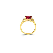 Center view of 14KT Yellow gold ring features a genuine garnet gemstone at the center, accented by two round brilliant cut diamonds on each side. A perfect blend of sophistication and charm.