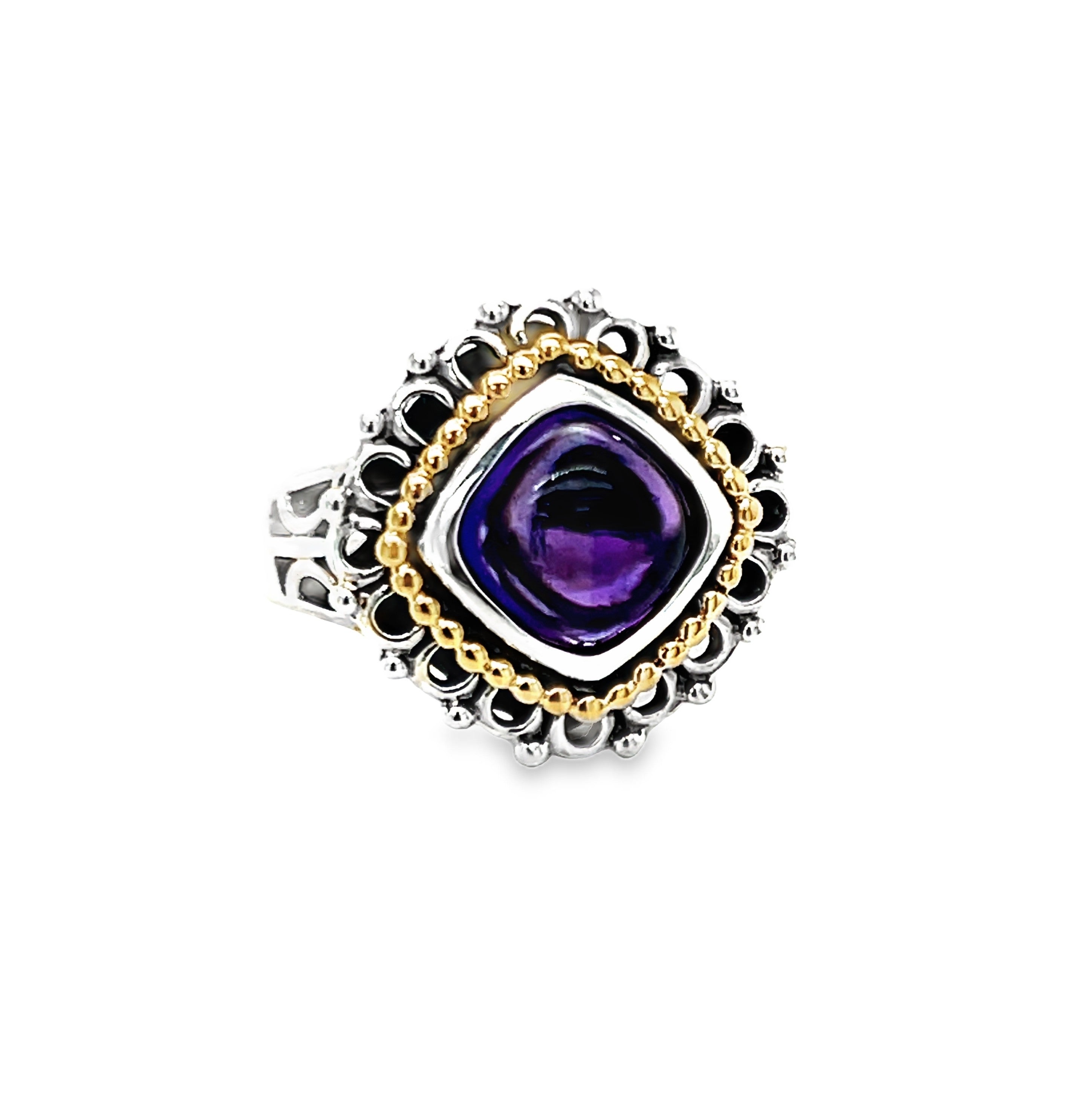 Front view f this  stunning handcrafted ring combines the elegance of sterling silver and 14KT yellow gold with the natural beauty of amethyst.